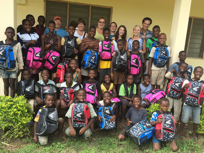 Group of kids with new backpacks